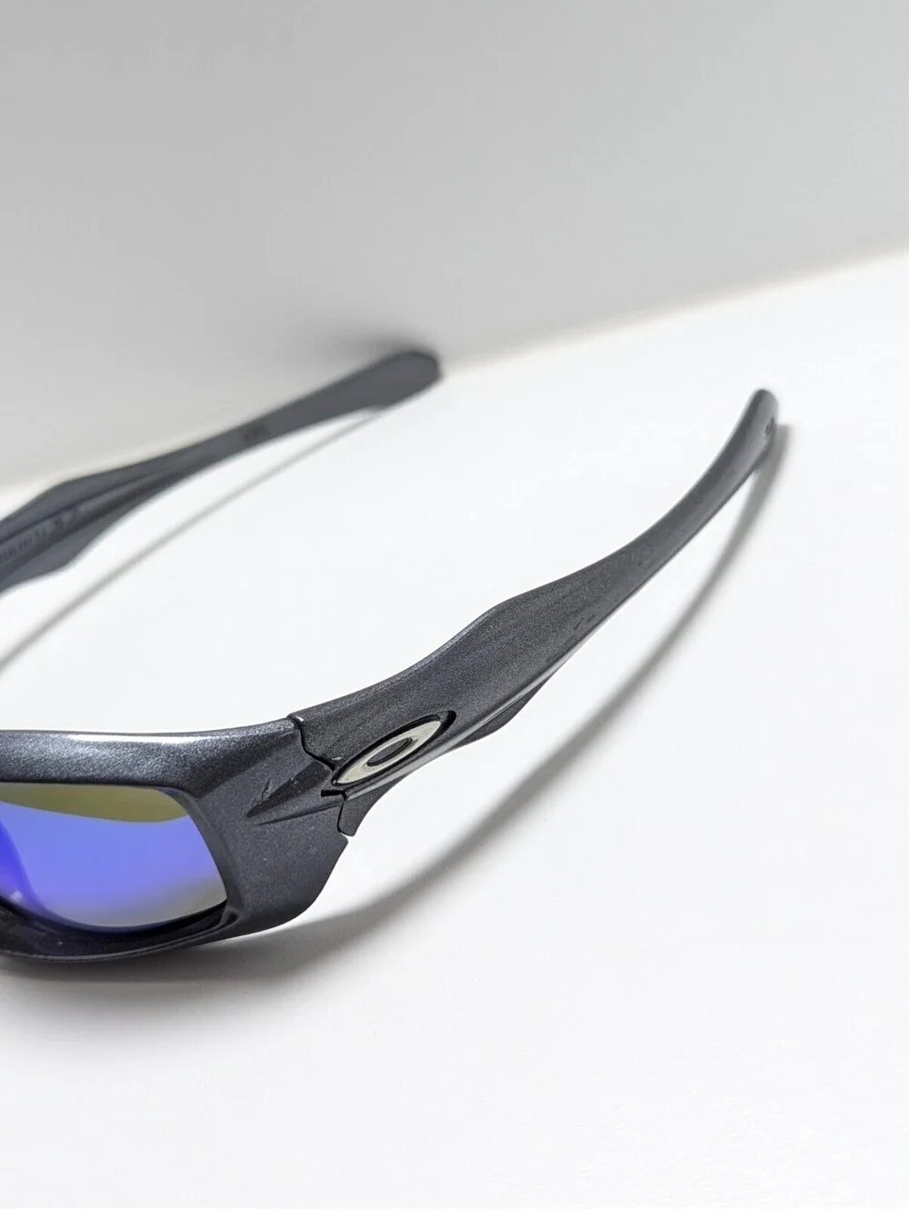 Oakley Monster Pup Blue Lens Polished Grey Silver Wrap Men’s Sport Sunglasses